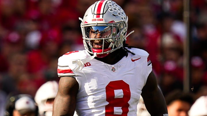 Ohio State Buckeyes linebacker Arvell Reese reacts during the game against the Wisconsin Badgers. Ohio State Buckeyes linebacker Arvell Reese reacts during the game against the Wisconsin Badgers.
