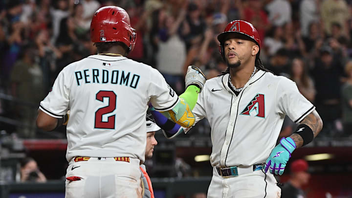 Jul 2, 2025; Phoenix, Arizona, USA; Arizona Diamondbacks second base Ketel Marte (4) celebrates with shortstop Geraldo Perdomo (2) after hitting a two run home run in the ninth inning against the San Francisco Giants at Chase Field. Mandatory Credit: Matt Kartozian-Imagn Images Jul 2, 2025; Phoenix, Arizona, USA; Arizona Diamondbacks second base Ketel Marte (4) celebrates with shortstop Geraldo Perdomo (2) after hitting a two run home run in the ninth inning against the San Francisco Giants at Chase Field. Mandatory Credit: Matt Kartozian-Imagn Images