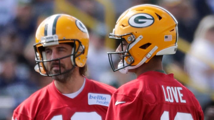 Green Bay Packers quarterback Aaron Rodgers (12) and Jordan Love at training camp in 2021.