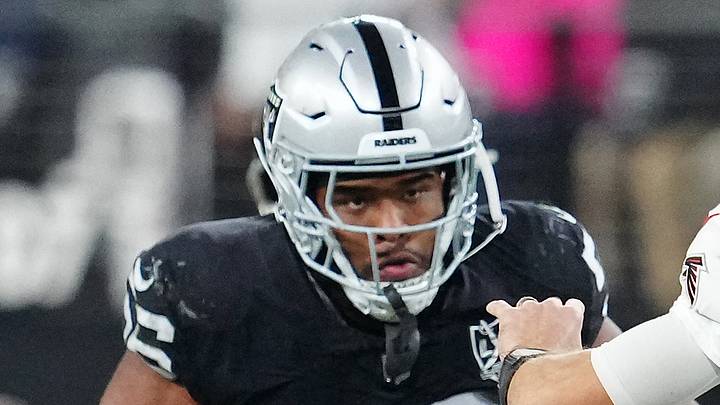 Dec 16, 2024; Paradise, Nevada, USA; Las Vegas Raiders linebacker Amari Burney (56) looks to sack Atlanta Falcons quarterback Kirk Cousins (18) during the third quarter at Allegiant Stadium. Mandatory Credit: Stephen R. Sylvanie-Imagn Images
