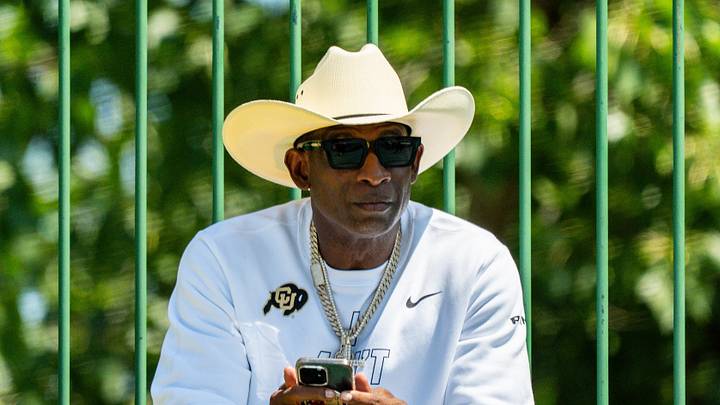 Deion Sanders takes in the second day of Cleveland Browns training camp, July 30, 2026, in Berea, Ohio. Deion Sanders takes in the second day of Cleveland Browns training camp, July 30, 2026, in Berea, Ohio.