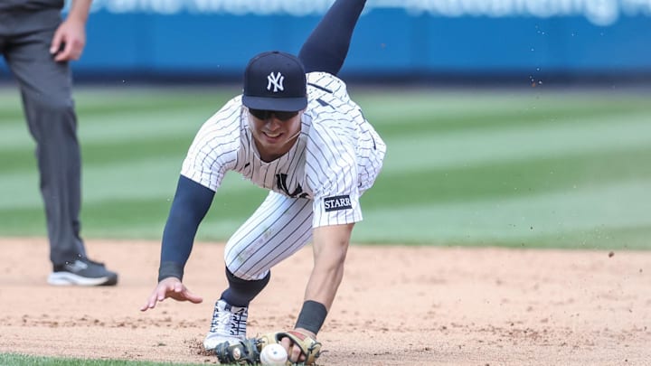 May 3, 2025; Bronx, New York, USA; New York Yankees shortstop Anthony Volpe (11) makes an error allowing a run to score in the eighth inning against the Tampa Bay Rays at Yankee Stadium. May 3, 2025; Bronx, New York, USA; New York Yankees shortstop Anthony Volpe (11) makes an error allowing a run to score in the eighth inning against the Tampa Bay Rays at Yankee Stadium.