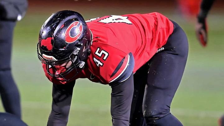 Cheshire's Simon Levine (45) blocked a potential game-tying extra-point, late in the Guardians 21-20 win over Glastonbury on Friday night. Just a few seconds later Evan Gonzalez blocked a 29-yard field goal attempt that would have given Glastonbury the win. Cheshire's Simon Levine (45) blocked a potential game-tying extra-point, late in the Guardians 21-20 win over Glastonbury on Friday night. Just a few seconds later Evan Gonzalez blocked a 29-yard field goal attempt that would have given Glastonbury the win.