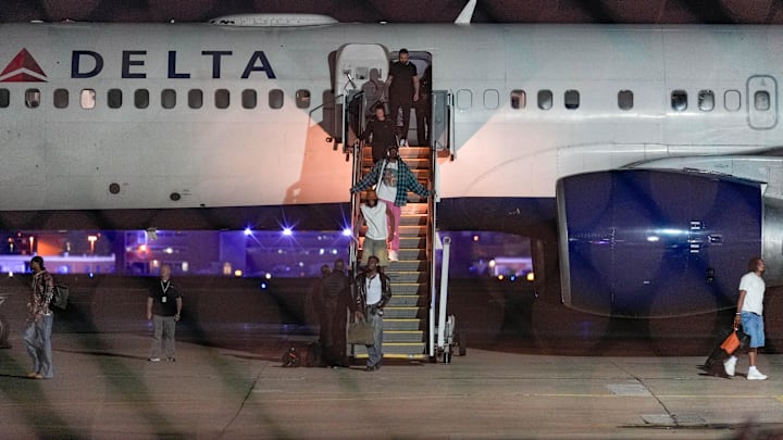 Thunder players walk off the plane at Will Rogers Airport in in Oklahoma City after game 6 of the NBA Finals, on Friday, June 20, 2025. Thunder players walk off the plane at Will Rogers Airport in in Oklahoma City after game 6 of the NBA Finals, on Friday, June 20, 2025.
