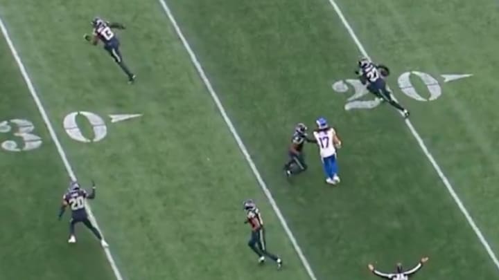 Los Angeles Rams wide receiver Puka Nacua is blocked by Seattle Seahawks CB Tyrel Dodson