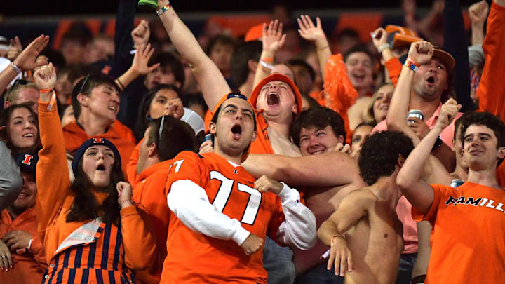 Sep 7, 2024; Champaign, Illinois, USA; Fighting Illini fans cheer during the second half against the Kansas Jayhawks at Memorial Stadium. Mandatory Credit: Ron Johnson-Imagn Images