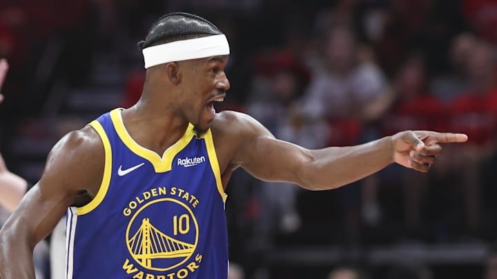 Apr 20, 2025; Houston, Texas, USA; Golden State Warriors forward Jimmy Butler III (10) reacts towards the crowd after scoring during the third quarter against the Houston Rockets at Toyota Center. Mandatory Credit: Troy Taormina-Imagn Images