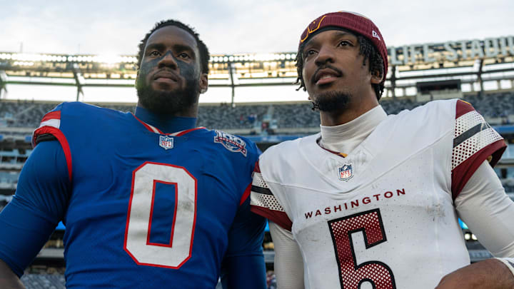 New York Giants linebacker Brian Burns (0) poses with Washington Commanders quarterback Jayden Daniels (5) after the game between the New York Giants and the Washington Commanders at MetLife Stadium in East Rutherford on Sunday, Nov. 3, 2024. New York Giants linebacker Brian Burns (0) poses with Washington Commanders quarterback Jayden Daniels (5) after the game between the New York Giants and the Washington Commanders at MetLife Stadium in East Rutherford on Sunday, Nov. 3, 2024.