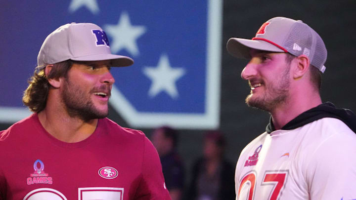 NFC defensive end Nick Bosa of the San Francisco 49ers (left) with brother and AFC linebacker Joey Bosa