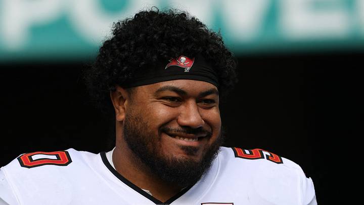 Dec 28, 2025; Miami Gardens, Florida, USA; Tampa Bay Buccaneers defensive tackle Vita Vea (50) walks out for player introductions prior to a game against the Miami Dolphins at Hard Rock Stadium. Mandatory Credit: Nathan Ray Seebeck-Imagn Images Dec 28, 2025; Miami Gardens, Florida, USA; Tampa Bay Buccaneers defensive tackle Vita Vea (50) walks out for player introductions prior to a game against the Miami Dolphins at Hard Rock Stadium. Mandatory Credit: Nathan Ray Seebeck-Imagn Images