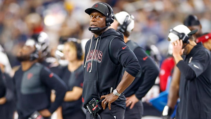 Atlanta Falcons head coach Raheem Morris looks up at the scoreboard during the fourth quarter against the Dallas Cowboys at AT&T Stadium.