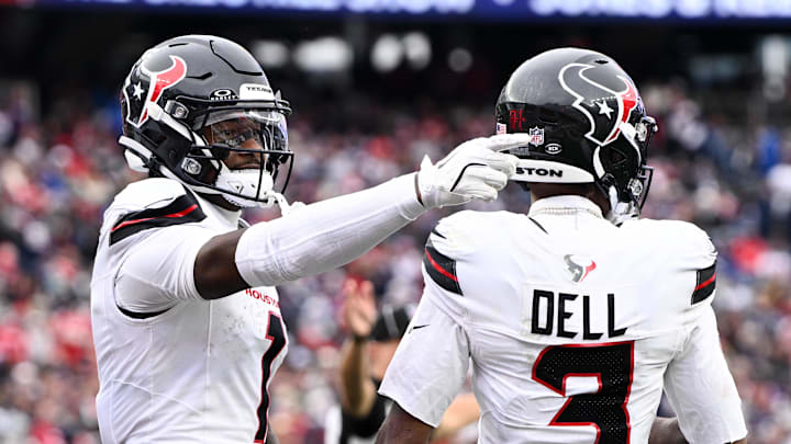 Oct 13, 2024; Foxborough, Massachusetts, USA; Houston Texans wide receiver Stefon Diggs (1) celebrates after scoring a touchdown against the New England Patriots during the second half at Gillette Stadium. Mandatory Credit: Brian Fluharty-Imagn Images