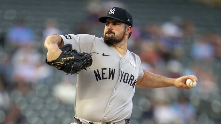 Sep 15, 2025; Minneapolis, Minnesota, USA; New York Yankees starting pitcher Carlos Rodon (55) delivers a pitch against the Minnesota Twins in the first inning at Target Field. Mandatory Credit: Jesse Johnson-Imagn Images