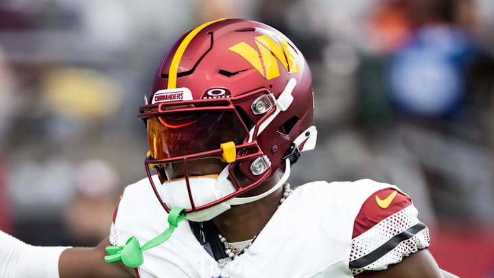 Sep 29, 2024; Glendale, Arizona, USA; Washington Commanders cornerback Emmanuel Forbes Jr. (13) against the Arizona Cardinals at State Farm Stadium. Mandatory Credit: Mark J. Rebilas-Imagn Images