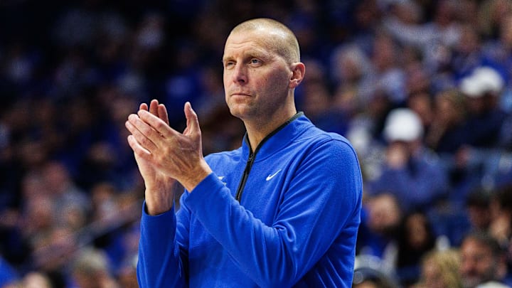 Oct 30, 2025; Lexington, KY, USA; Kentucky Wildcats head coach Mark Pope claps as he watches the action during the first half against the Georgetown Hoyas at Rupp Arena at Central Bank Center. Mandatory Credit: Jordan Prather-Imagn Images Oct 30, 2025; Lexington, KY, USA; Kentucky Wildcats head coach Mark Pope claps as he watches the action during the first half against the Georgetown Hoyas at Rupp Arena at Central Bank Center. Mandatory Credit: Jordan Prather-Imagn Images