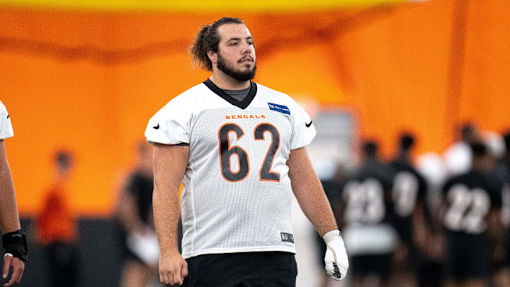 Cincinnati Bengals center Nate Gilliam (66), Cincinnati Bengals center Matt Lee (62) and Cincinnati Bengals offensive tackle Eric Miller (74) look on at Bengals spring practice at the IEL Indoor Facility in Cincinnati on Thursday, June 13, 2024. Cincinnati Bengals center Nate Gilliam (66), Cincinnati Bengals center Matt Lee (62) and Cincinnati Bengals offensive tackle Eric Miller (74) look on at Bengals spring practice at the IEL Indoor Facility in Cincinnati on Thursday, June 13, 2024.