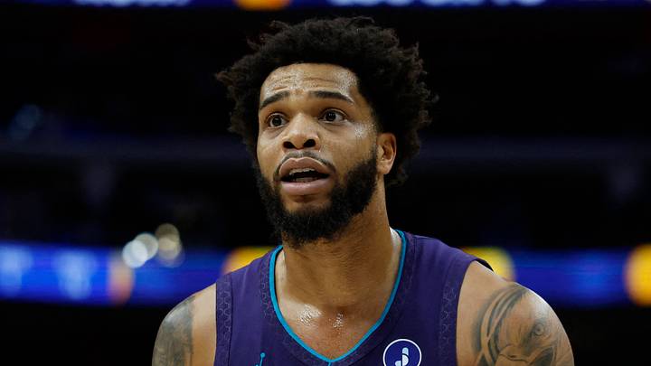 Detroit, Michigan, USA; Charlotte Hornets forward Miles Bridges (0) reacts in the first half against the Detroit Pistons at Little Caesars Arena on Dec 20, 2025.