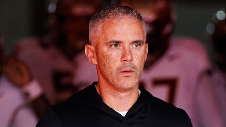 Nov 29, 2025; Gainesville, Florida, USA; Florida State Seminoles head coach Mike Norvell walks out of the tunnel before a game against the Florida Gators at Ben Hill Griffin Stadium. Mandatory Credit: Matt Pendleton-Imagn Images