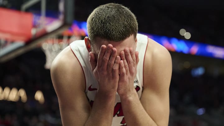 Miami Heat forward Nikola Jovic (5) covers his face  (Mandatory Credit: Troy Wayrynen-Imagn Images)