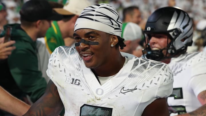 Sep 27, 2025; University Park, Pennsylvania, USA; Oregon Ducks running back Jordon Davison (0) reacts after defeating the Penn State Nittany Lions at Beaver Stadium. Mandatory Credit: Matthew O'Haren-Imagn Images