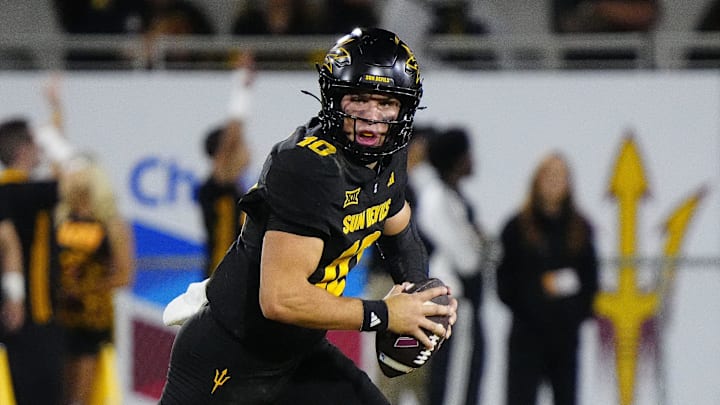 Arizona State quarterback Sam Leavitt (10) scrambles out of the pocket against TCU during a game at Mountain America Stadium in Tempe on Sept. 26, 2025.