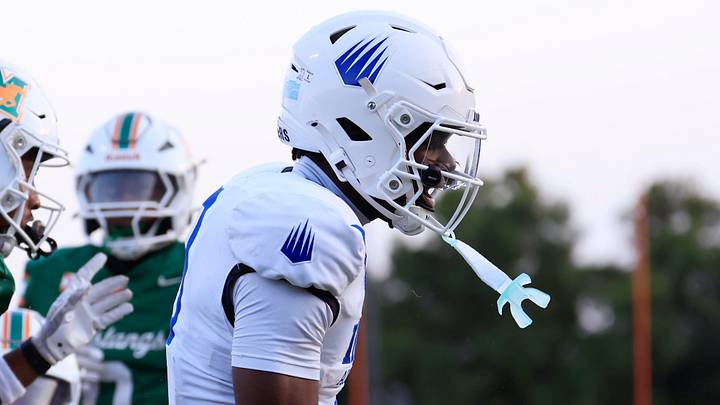 IMG Academy's Eric McFarland (3) reacts to his touchdown score during the first quarter of a high school football matchup at Mandarin High School, Friday, Sept. 19, 2025, in Jacksonville, Fla. The IMG Academy Ascenders defeated the Mandarin Mustangs 57-7.