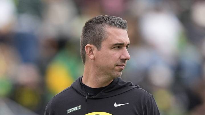 Oregon inside linebackers coach Brian Michalowski walks the field during Oregon’s spring game on April 26, 2025, at Autzen Stadium in Eugene. Oregon inside linebackers coach Brian Michalowski walks the field during Oregon’s spring game on April 26, 2025, at Autzen Stadium in Eugene.
