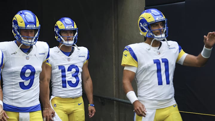 Aug 24, 2024; Houston, Texas, USA; Los Angeles Rams quarterback Dresser Winn (4) and quarterback Matthew Stafford (9) and quarterback Stetson Bennett (13) and quarterback Jimmy Garoppolo (11) walk onto the field before the game against the Houston Texans at NRG Stadium. Mandatory Credit: Troy Taormina-Imagn Images
