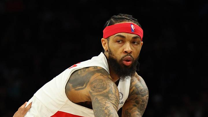 Toronto Raptors forward Brandon Ingram passes the ball against Phoenix Suns forward Ryan Dunn. Toronto Raptors forward Brandon Ingram passes the ball against Phoenix Suns forward Ryan Dunn.