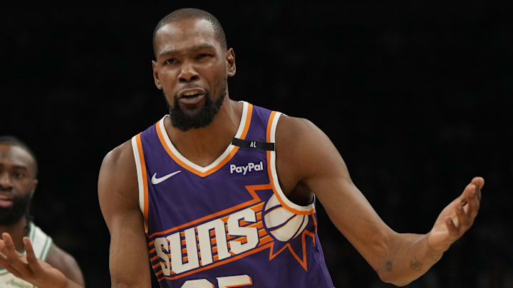 Mar 26, 2025; Phoenix, Arizona, USA; Phoenix Suns forward Kevin Durant (35) reacts after a foul call against the Boston Celtics during the first half at Footprint Center. Mandatory Credit: Rick Scuteri-Imagn Images