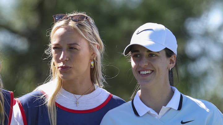 Indiana Fever guards Sophie Cunningham (8) and Caitlin Clark.