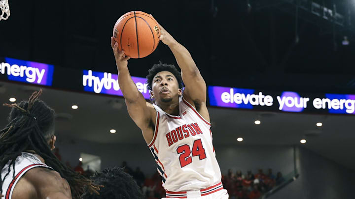 Houston Cougars forward Chase McCarty (24) grabs a rebound during the first half against the Texas Tech Red Raiders at Fertitta Center. Houston Cougars forward Chase McCarty (24) grabs a rebound during the first half against the Texas Tech Red Raiders at Fertitta Center.