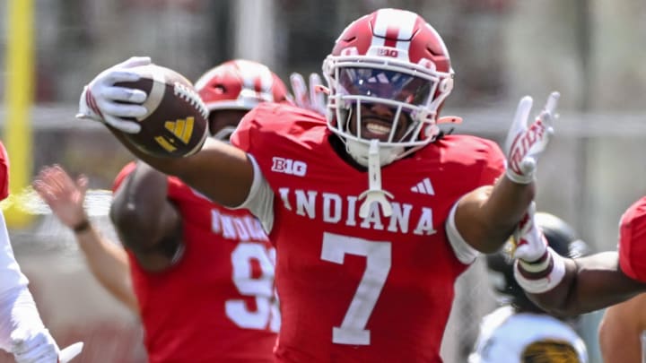 Indiana Hoosiers defensive back Louis Moore celebrates after forcing a turnover against Kennesaw State at Memorial Stadium. Indiana Hoosiers defensive back Louis Moore celebrates after forcing a turnover against Kennesaw State at Memorial Stadium.