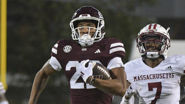 Mississippi State Bulldogs running back Xavier Gayten (22) runs the ball against the Massachusetts Minutemen during the fourth quarter at Davis Wade Stadium at Scott Field.