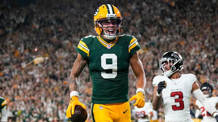 Green Bay Packers receiver Christian Watson reacts after scoring a touchdown against the Falcons. Green Bay Packers receiver Christian Watson reacts after scoring a touchdown against the Falcons.