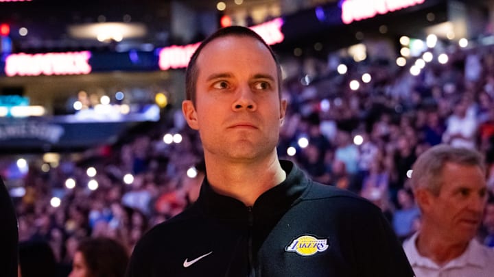 Feb 25, 2024; Phoenix, Arizona, USA; Los Angeles Lakers assistant coach Phil Handy (left) and Jordan Ott against the Phoenix Suns at Footprint Center. Mandatory Credit: Mark J. Rebilas-USA TODAY Sports