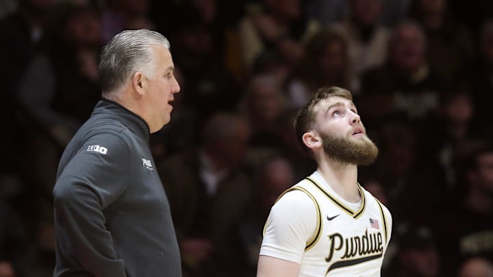 Purdue Boilermakers head coach Matt Painter talks to Purdue Boilermakers guard Braden Smith (3) Friday, Feb. 7, 2025, during the NCAA men’s basketball game at Mackey Arena in West Lafayette, Ind. Purdue Boilermakers head coach Matt Painter talks to Purdue Boilermakers guard Braden Smith (3) Friday, Feb. 7, 2025, during the NCAA men’s basketball game at Mackey Arena in West Lafayette, Ind.