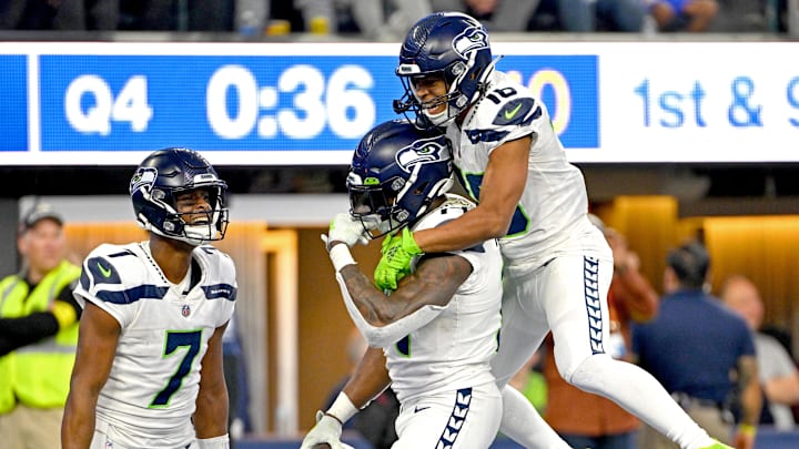 Dec 4, 2022; Inglewood, California, USA; Seattle Seahawks wide receiver Tyler Lockett (16) celebrates with quarterback Geno Smith (7) and wide receiver DK Metcalf (14) after a touchdown in the fourth quarter against the Los Angeles Rams at SoFi Stadium. Mandatory Credit: Jayne Kamin-Oncea-Imagn Images Dec 4, 2022; Inglewood, California, USA; Seattle Seahawks wide receiver Tyler Lockett (16) celebrates with quarterback Geno Smith (7) and wide receiver DK Metcalf (14) after a touchdown in the fourth quarter against the Los Angeles Rams at SoFi Stadium. Mandatory Credit: Jayne Kamin-Oncea-Imagn Images
