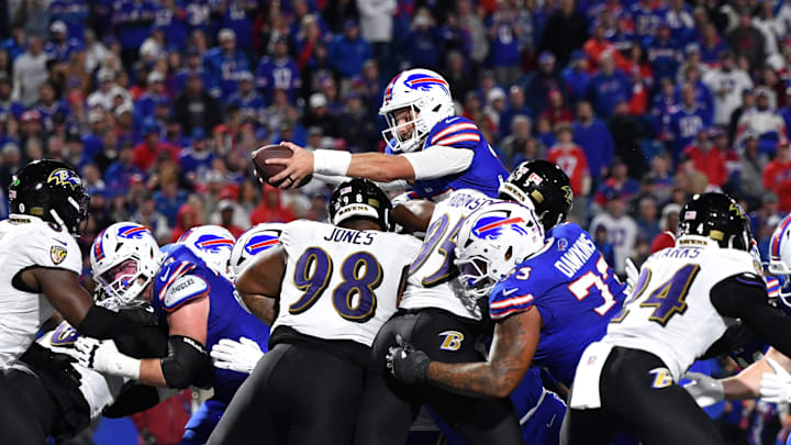 Sep 7, 2025; Orchard Park, New York, USA;  Buffalo Bills quarterback Josh Allen (17) score a touchdown during the fourth quarter against the Baltimore Ravens at Highmark Stadium. Mandatory Credit: Mark Konezny-Imagn Images