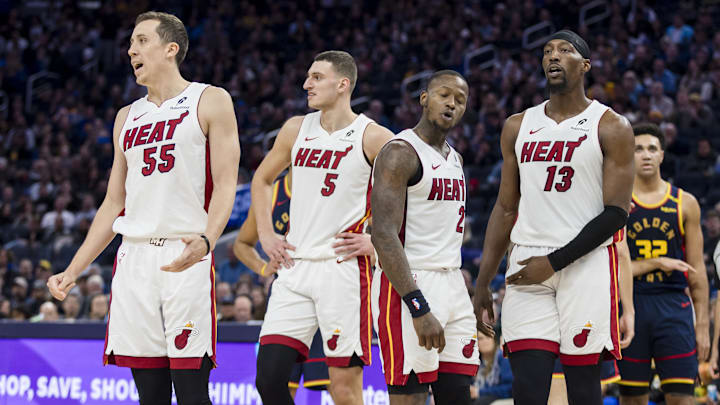 Jan 7, 2025; San Francisco, California, USA; Miami Heat forward Duncan Robinson (55) and forward Nikola Jovic (5) and guard Terry Rozier (2) and center Bam Adebayo (13) react to a foul call during the fourth quarter against the Golden State Warriorsat Chase Center. Mandatory Credit: John Hefti-Imagn Images Jan 7, 2025; San Francisco, California, USA; Miami Heat forward Duncan Robinson (55) and forward Nikola Jovic (5) and guard Terry Rozier (2) and center Bam Adebayo (13) react to a foul call during the fourth quarter against the Golden State Warriorsat Chase Center. Mandatory Credit: John Hefti-Imagn Images