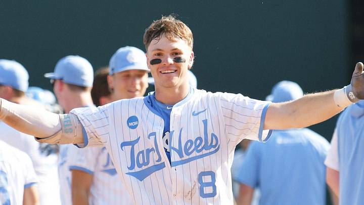 June 7, 2026; Chapel Hill, NC, USA; North Carolina Tar Heels outfielder Owen Hull (8) celebrates with head coach Scott Forbes after his game winning hit against the USC Trojans at Boshamer Stadium. Mandatory Credit: Zachary Taft-Imagn Images June 7, 2026; Chapel Hill, NC, USA; North Carolina Tar Heels outfielder Owen Hull (8) celebrates with head coach Scott Forbes after his game winning hit against the USC Trojans at Boshamer Stadium. Mandatory Credit: Zachary Taft-Imagn Images