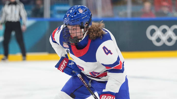 Feb 10, 2026; Milan, Italy; Caroline Harvey (4) of the United States shoots and scores a goal against Canada in women's ice hockey group A play during the Milano Cortina 2026 Olympic Winter Games at Milano Santagiulia Ice Hockey Arena. Mandatory Credit: Amber Searls-Imagn Images Feb 10, 2026; Milan, Italy; Caroline Harvey (4) of the United States shoots and scores a goal against Canada in women's ice hockey group A play during the Milano Cortina 2026 Olympic Winter Games at Milano Santagiulia Ice Hockey Arena. Mandatory Credit: Amber Searls-Imagn Images