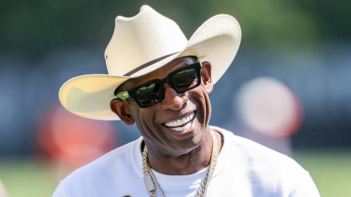 Jul 30, 2026; Berea, OH, USA; Cleveland Browns quarterback Shedeur Sanders (2) talks with his father Deion Sanders during training camp at CrossCountry Mortgage Campus. Mandatory Credit: Ken Blaze-Imagn Images Jul 30, 2026; Berea, OH, USA; Cleveland Browns quarterback Shedeur Sanders (2) talks with his father Deion Sanders during training camp at CrossCountry Mortgage Campus. Mandatory Credit: Ken Blaze-Imagn Images