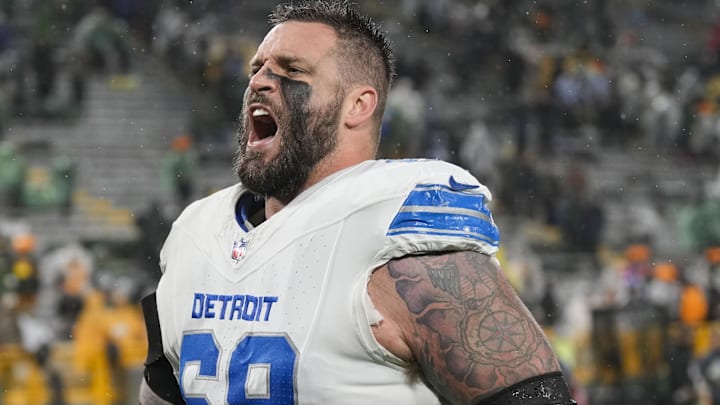 Detroit Lions offensive tackle Taylor Decker (68) celebrates as he runs off the field following Green Bay Packers game Detroit Lions offensive tackle Taylor Decker (68) celebrates as he runs off the field following Green Bay Packers game