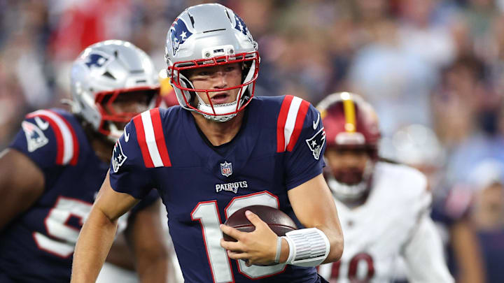 Aug 8, 2025; Foxborough, Massachusetts, USA; New England Patriots quarterback Drake Maye (10) runs the ball during the first half against the Washington Commanders at Gillette Stadium. Mandatory Credit: Paul Rutherford-Imagn Images