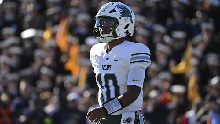 Nov 16, 2024; Annapolis, Maryland, USA;  Tulane Green Wave quarterback Darian Mensah (10) stand son there field during the first quarter against the Navy Midshipmen at Navy-Marine Corps Memorial Stadium