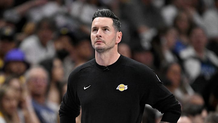 Los Angeles Lakers coach JJ Redick stands on the sidelines. Los Angeles Lakers coach JJ Redick stands on the sidelines.