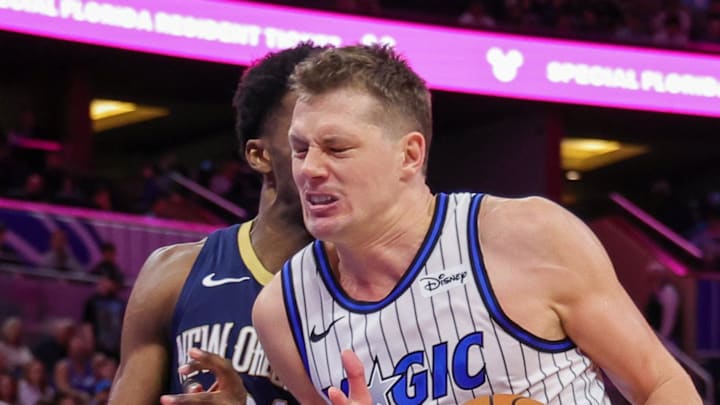 Orlando Magic forward Moritz Wagner is fouled by New Orleans Pelicans center Yves Missi.