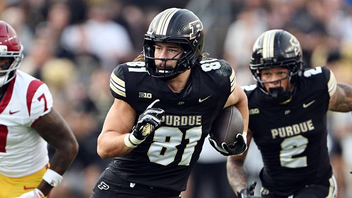 Purdue Boilermakers tight end George Burhenn (81) runs the ball.