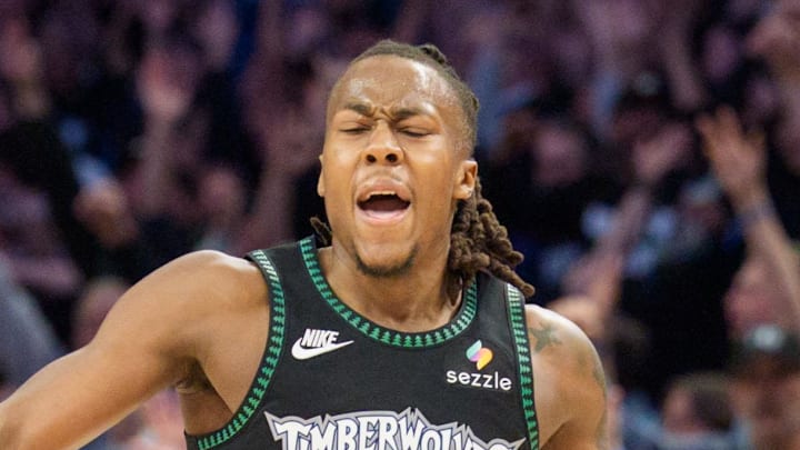 Apr 25, 2026; Minneapolis, Minnesota, USA; Minnesota Timberwolves guard Ayo Dosunmu (13) celebrates with fans after making a three-point shot against the Denver Nuggets in the fourth quarter at Target Center. Mandatory Credit: Matt Blewett-Imagn Images